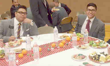 Elders eating lunch/dinner at a zone conference.