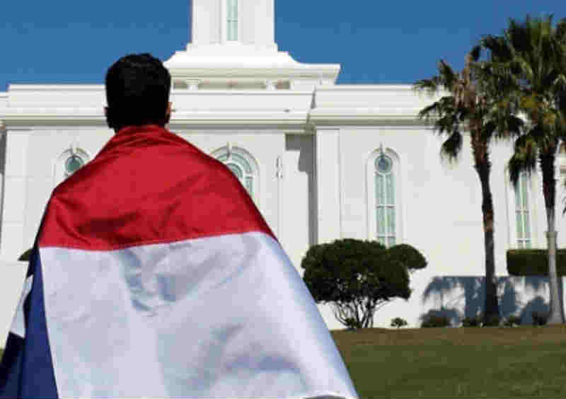 Elder Caldes and the Texas Flag at the LDS Orlando Temple. 